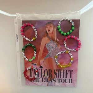 Taylor Swift poster and friendship bracelets